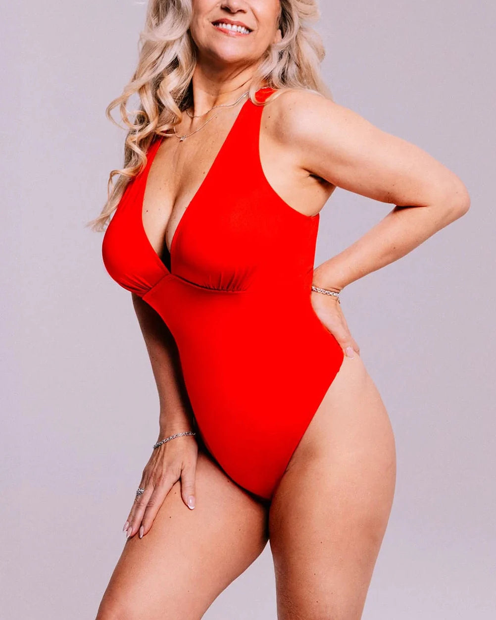 Bare Essentials™ AirSlim® Deep V-Neck Cross Back Thong Bodysuit